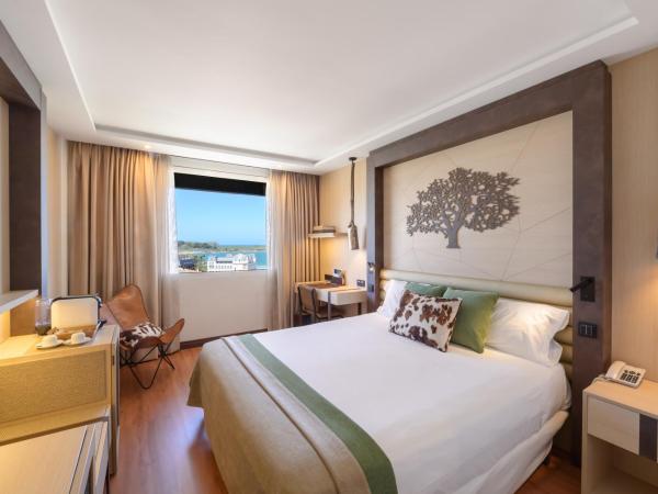 Santemar : photo 1 de la chambre chambre double ou lits jumeaux deluxe - vue sur mer