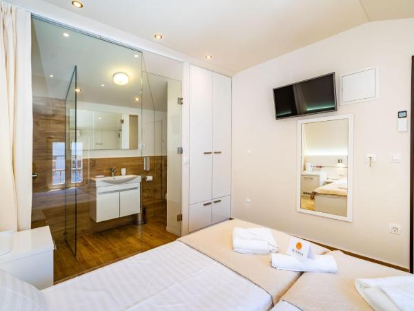 Idassa Palace rooms : photo 9 de la chambre chambre double ou lits jumeaux