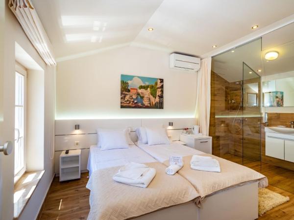 Idassa Palace rooms : photo 1 de la chambre chambre double ou lits jumeaux