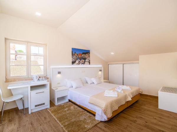 Idassa Atrium rooms : photo 7 de la chambre chambre double ou lits jumeaux avec terrasse