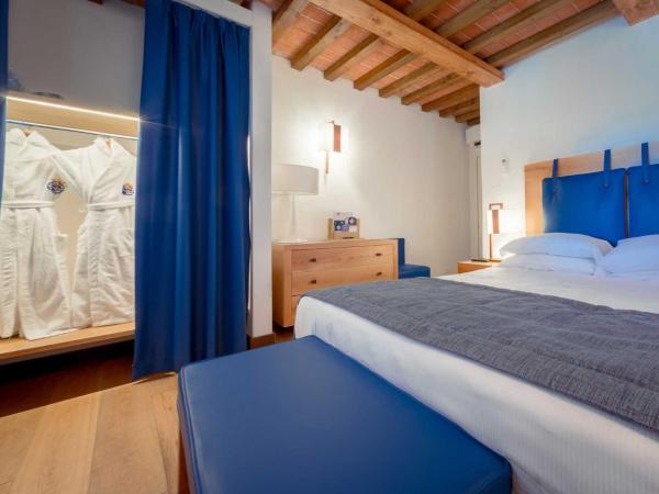 Villa Tolomei Hotel & Resort : photo 1 de la chambre appartement - rez-de-chaussée