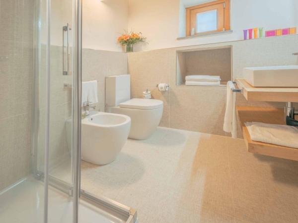 Villa Tolomei Hotel & Resort : photo 8 de la chambre appartement - rez-de-chaussée