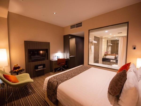 Park Avenue Changi : photo 2 de la chambre chambre lit king-size deluxe