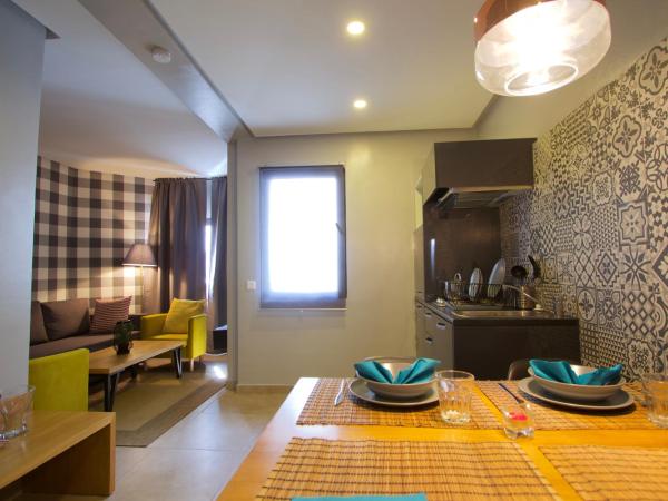 Suite Loc Luxury Aparthotel : photo 10 de la chambre appartement supérieur pop art