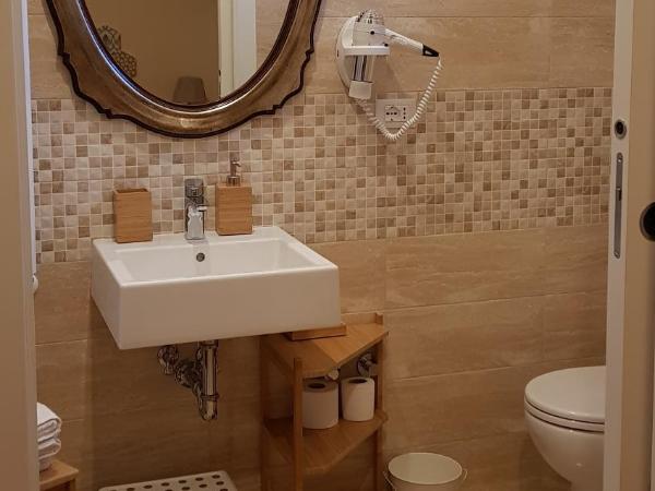 Guest house Il Giardino in Città : photo 1 de la chambre chambre simple avec salle de bains