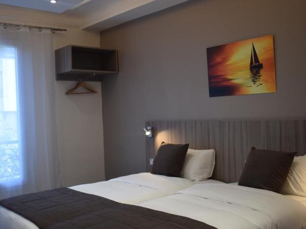 Hotel Puy De Dôme : photo 1 de la chambre chambre lits jumeaux