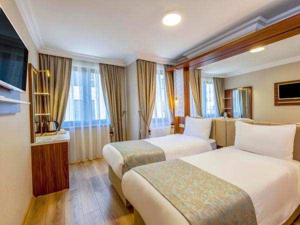 Kupeli Hotel : photo 4 de la chambre 2 chambres doubles communicantes