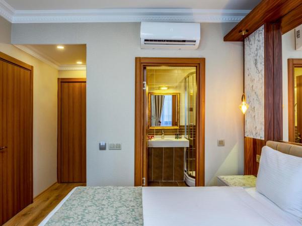 Kupeli Hotel : photo 5 de la chambre 2 chambres doubles communicantes