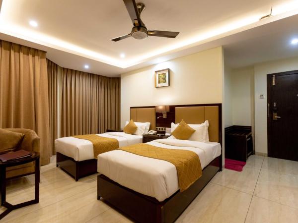 Hotel Godwin - Colaba : photo 3 de la chambre chambre deluxe double ou lits jumeaux