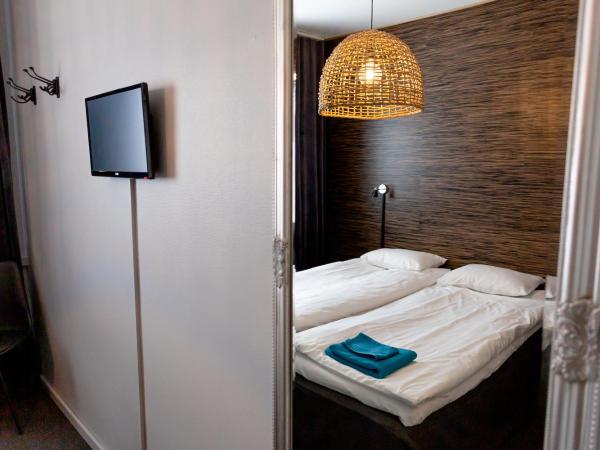 CarlstadCity H Boutique Hotell : photo 5 de la chambre chambre lits jumeaux