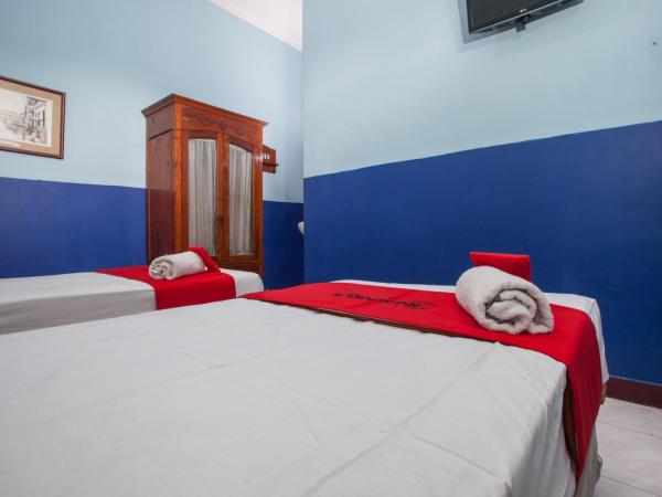 RedDoorz @ Genteng Surabaya 2 : photo 5 de la chambre chambre lits jumeaux