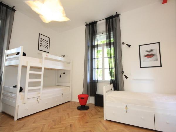 The Hostel : photo 1 de la chambre lit simple en dortoir mixte - vue sur jardin