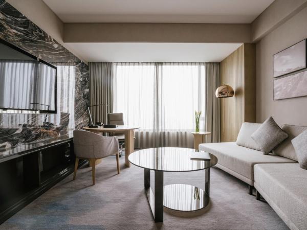 Pullman Shanghai Qingpu Excellence : photo 7 de la chambre deluxe king suite with city view - lounge access