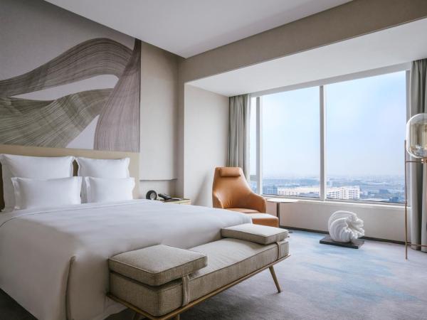 Pullman Shanghai Qingpu Excellence : photo 8 de la chambre deluxe king suite with city view - lounge access
