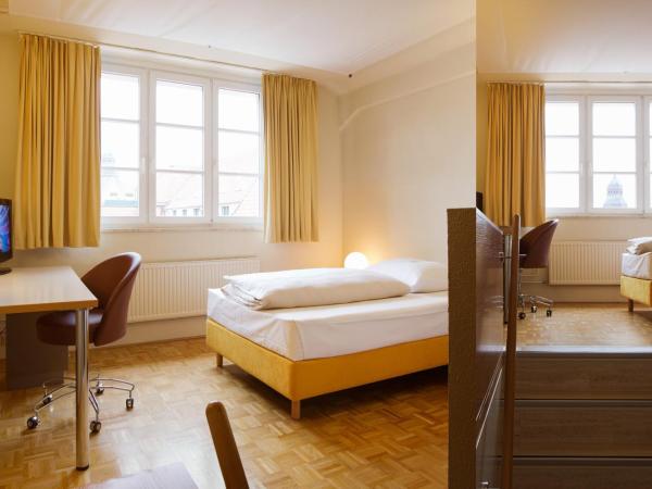 Gästeresidenz PelikanViertel : photo 2 de la chambre chambre simple plus Économique