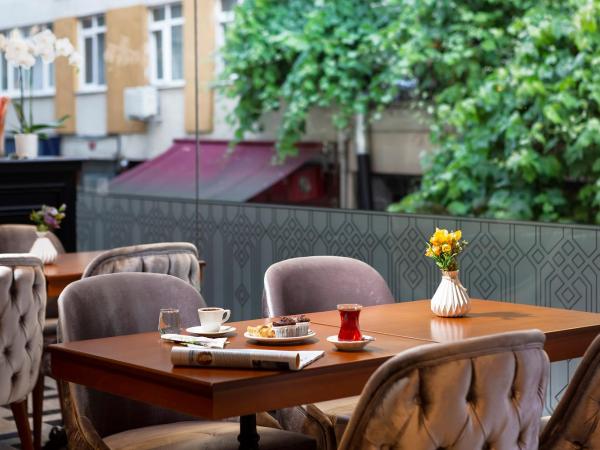 Güner Business Hotel : photo 4 de la chambre chambre double deluxe (2 adultes + 1 enfant)