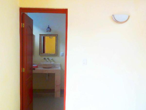 Merida Santiago Hotel Boutique : photo 8 de la chambre chambre lit king-size de luxe - vue sur piscine