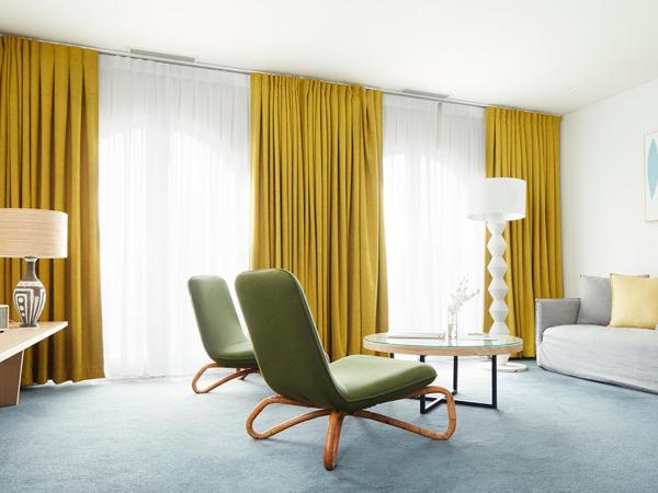 Hotel Ravesis : photo 5 de la chambre suite lit king-size - vue latérale