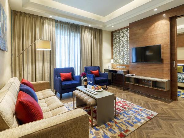 Ramada Gurgaon Central : photo 1 de la chambre executive suite with happy hours (1+1 ;only applicable for imfl not all the brand at the bar) and 20% discount on f&b