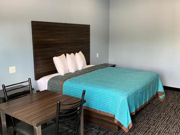 Scottish Inns and Suites Scarsdale : photo 1 de la chambre chambre lit king-size