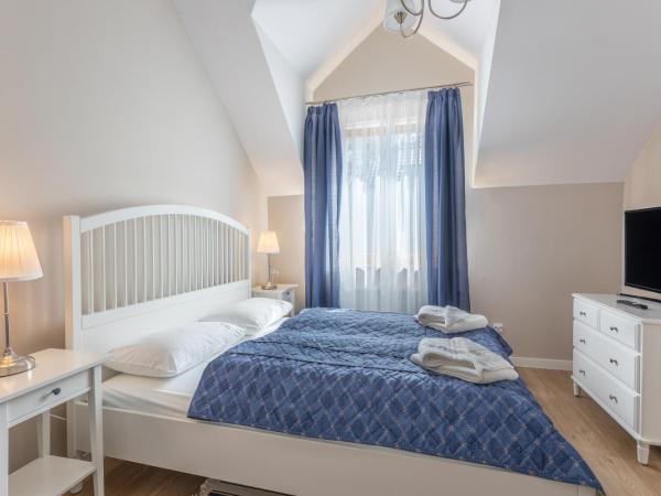 Willa 4 Pory Roku & Uznam : photo 3 de la chambre chambre double