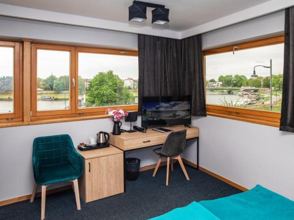 Hotel Pod Wawelem : photo 5 de la chambre chambre lits jumeaux de luxe avec vue sur la rivière

