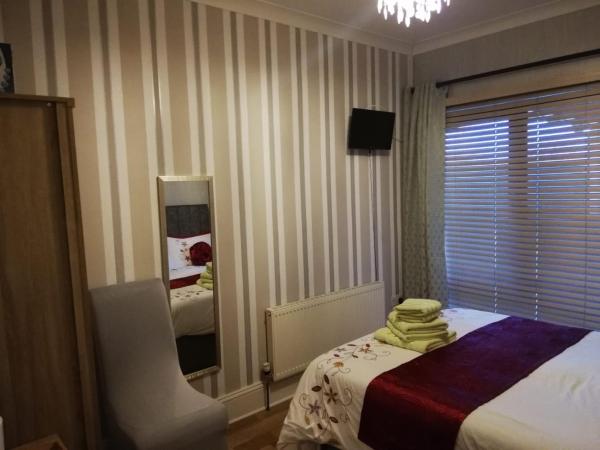 Hunters Lodge B&B : photo 5 de la chambre chambre double avec salle de bains commune