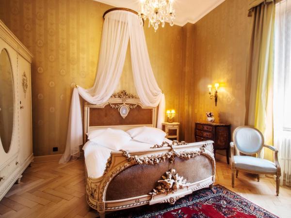 International au Lac Historic Lakeside Hotel : photo 1 de la chambre chambre double belle Époque avec lit à baldaquin