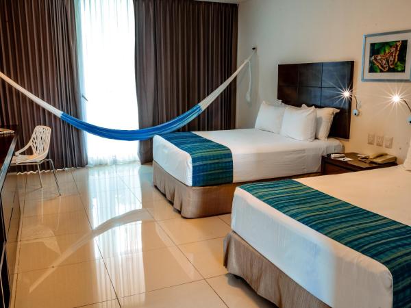 Mesón de la Luna Hotel & Spa : photo 3 de la chambre superior deluxe room with mini refrigerator and garden view, 2 double beds