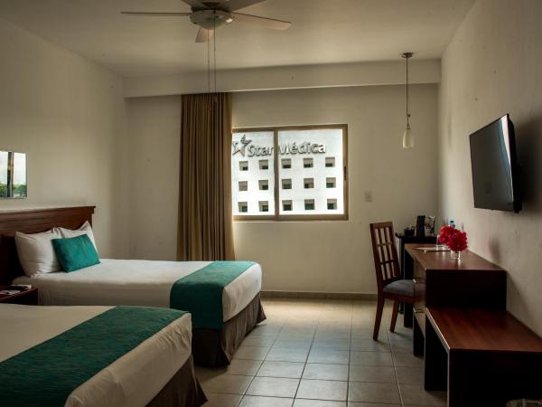 Mesón de la Luna Hotel & Spa : photo 4 de la chambre deluxe room with mini refrigerator and garden view, 2 double beds