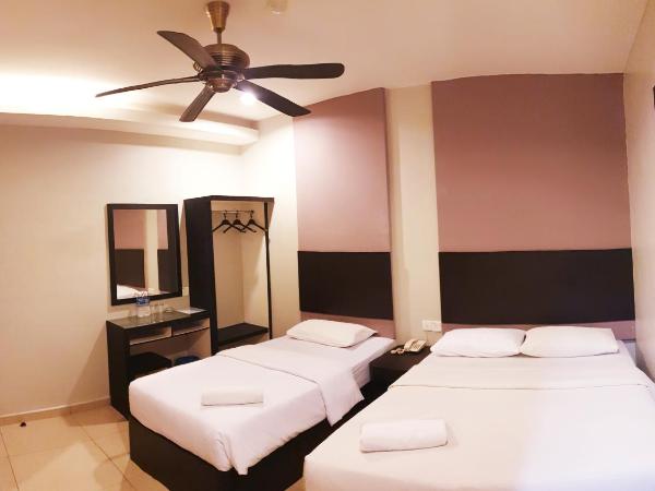 Golden Court Hotel - Tun Abdul Razak : photo 3 de la chambre chambre triple deluxe