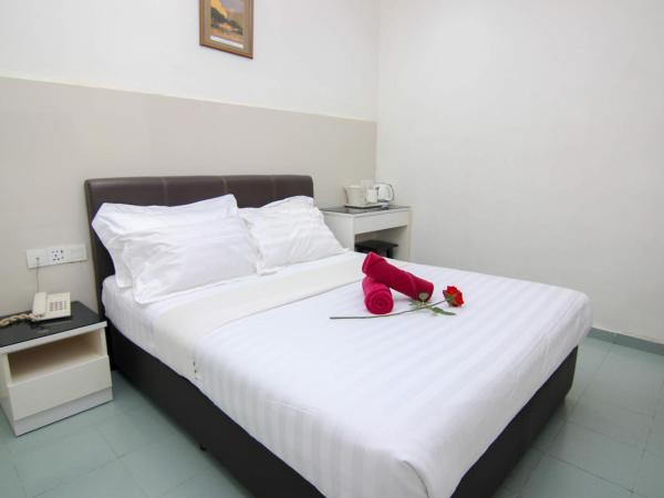 Rose Cottage Hotel Taman Johor Jaya : photo 1 de la chambre chambre double deluxe