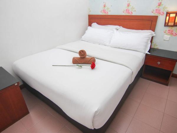 Rose Cottage Hotel Taman Daya : photo 3 de la chambre chambre double deluxe