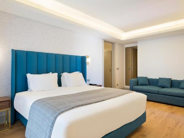 Acta The Avenue : photo 2 de la chambre chambre double avec lit d'appoint