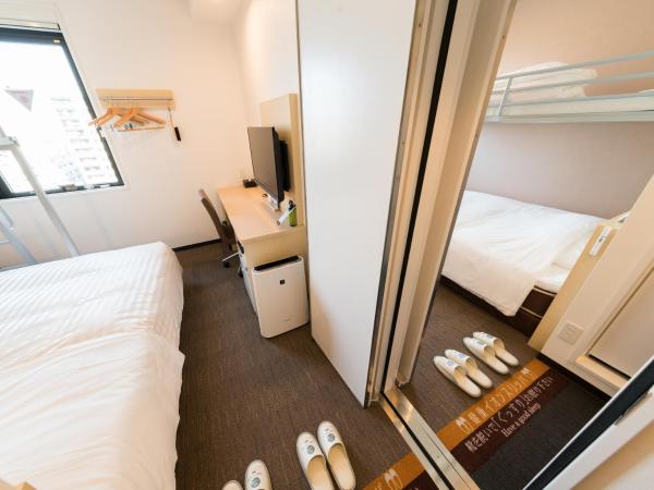 Super Hotel Tokyo Kinshicho Ekimae : photo 2 de la chambre chambre adjacente