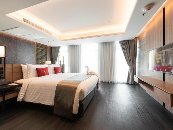 Ramada Plaza by Wyndham Chao Fah Phuket : photo 2 de la chambre suite 1 chambre lit king-size