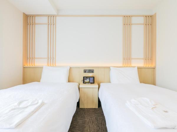 Henn na Hotel Kyoto Hachijoguchi : photo 6 de la chambre chambre lits jumeaux phiten