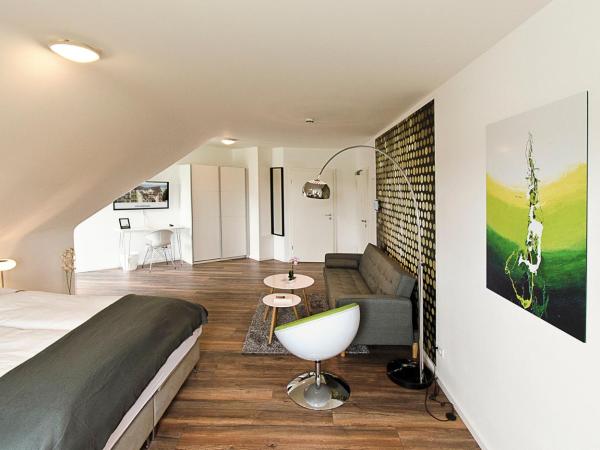 Eco Smart Apartments Nürnberg Süd : photo 3 de la chambre appartement suite confort avec canapé-lit