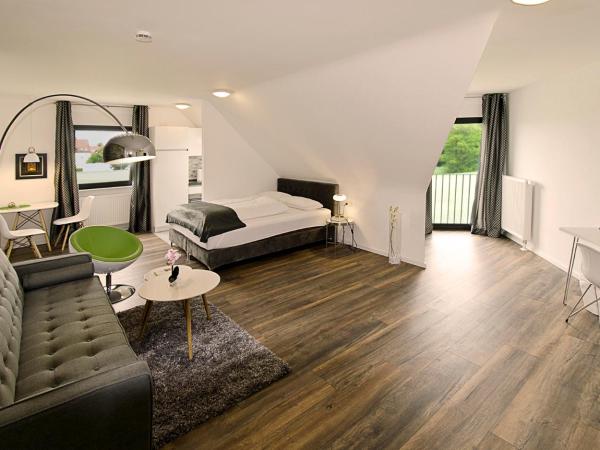 Eco Smart Apartments Nürnberg Süd : photo 1 de la chambre appartement suite confort avec canapé-lit