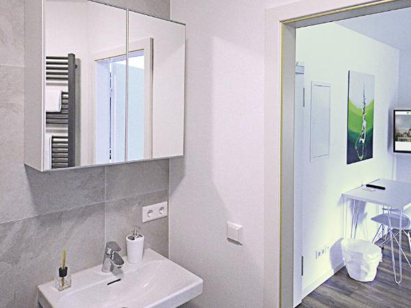 Eco Smart Apartments Nürnberg Süd : photo 7 de la chambre appartement deluxe 1 chambre avec balcon ou terrasse