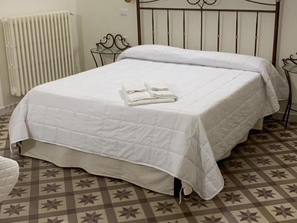 Pietre e Sassi : photo 3 de la chambre chambre quadruple avec salle de bains privative