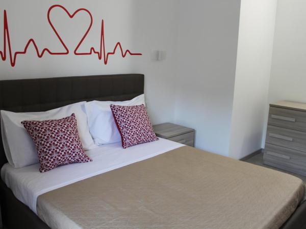 Le Coccole : photo 3 de la chambre chambre double deluxe avec balcon