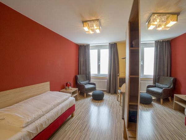 City Hotel Hannover : photo 3 de la chambre chambre simple avec salle de bains