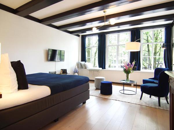 1637: Historic Canal View Suites : photo 1 de la chambre suite deluxe avec lit king-size