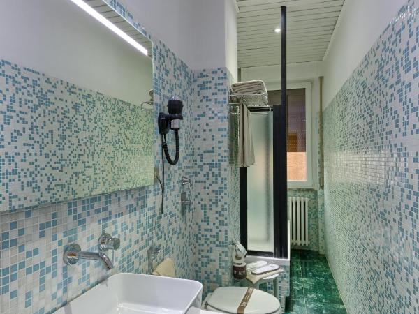 Agape Hotel AA Hotels : photo 1 de la chambre chambre quadruple