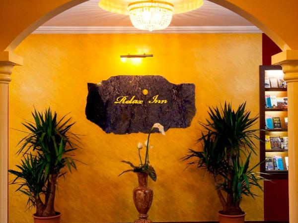 Relax Inn : photo 7 de la chambre chambre double avec lit d'appoint (3 adultes)