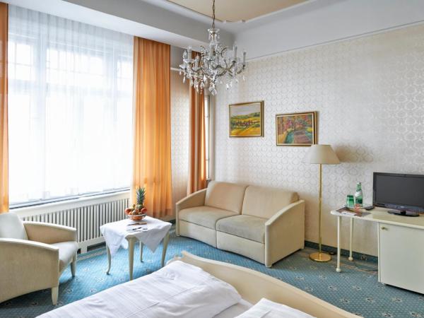 Hotel Pension Baronesse : photo 1 de la chambre chambre quadruple confort