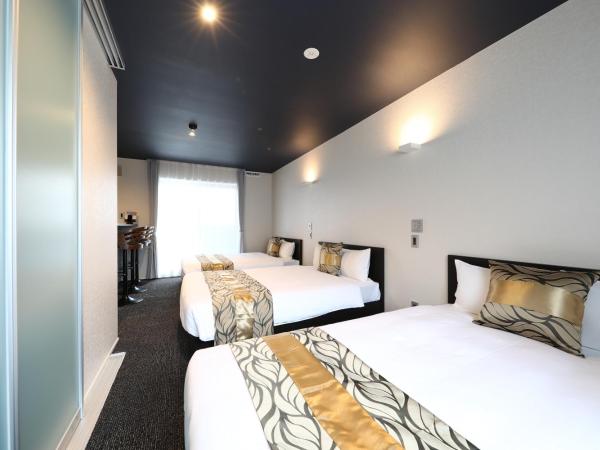 GRAND BASE Hakata City : photo 6 de la chambre suite familiale