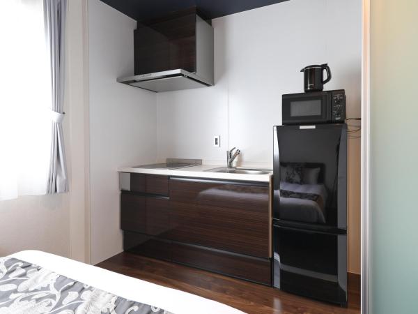 GRAND BASE Hakata City : photo 9 de la chambre suite familiale