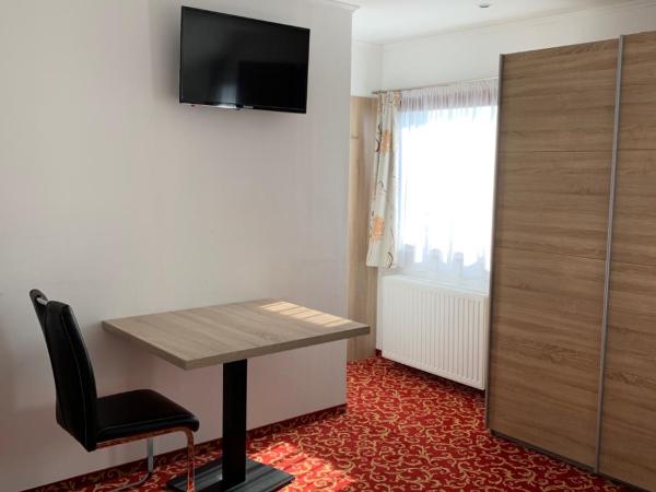 Appartement Steinbichler : photo 3 de la chambre chambre double ou lits jumeaux - vue sur ville